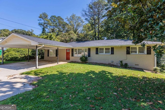 ranch-style home with a front lawn and a carport