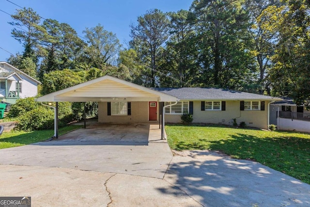 single story home with a front lawn and a carport