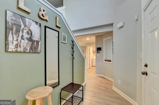 corridor featuring light hardwood / wood-style flooring