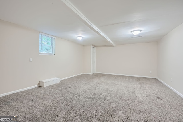 basement featuring carpet flooring