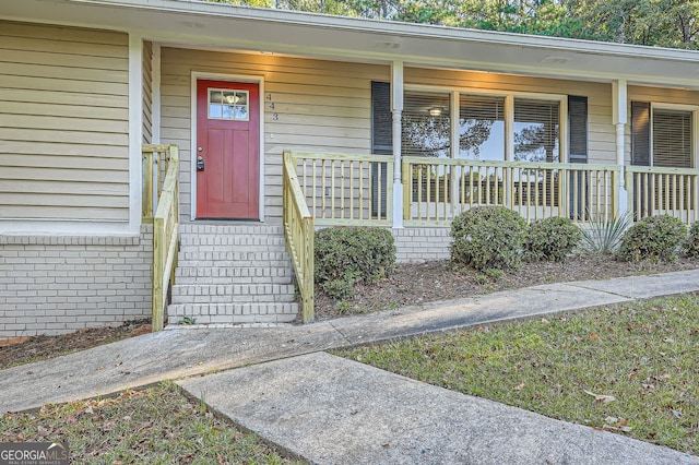 property entrance with a porch