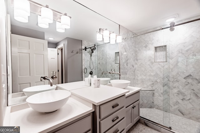 bathroom with an enclosed shower and vanity