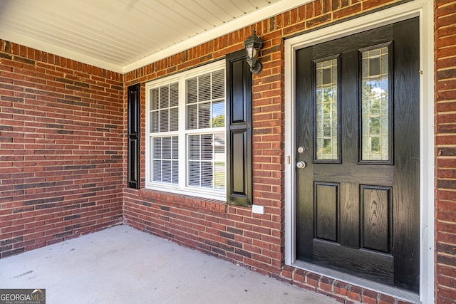 property entrance with a porch