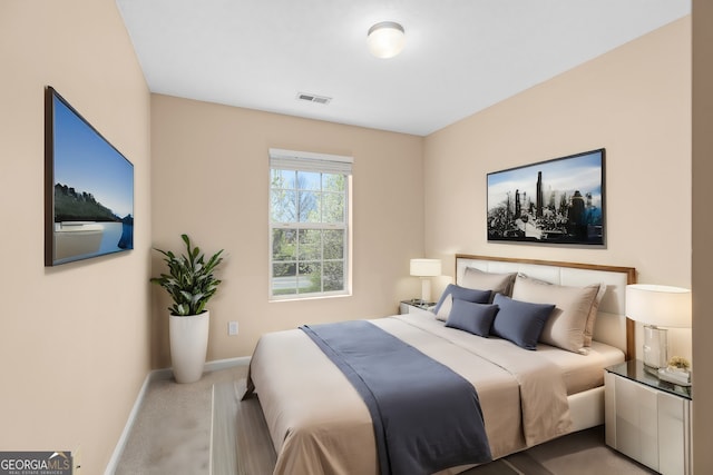 bedroom with light carpet