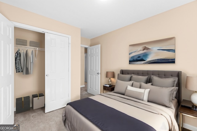 bedroom with a closet and carpet