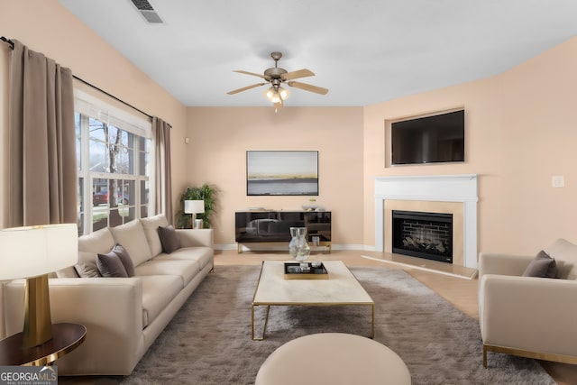 living room featuring ceiling fan