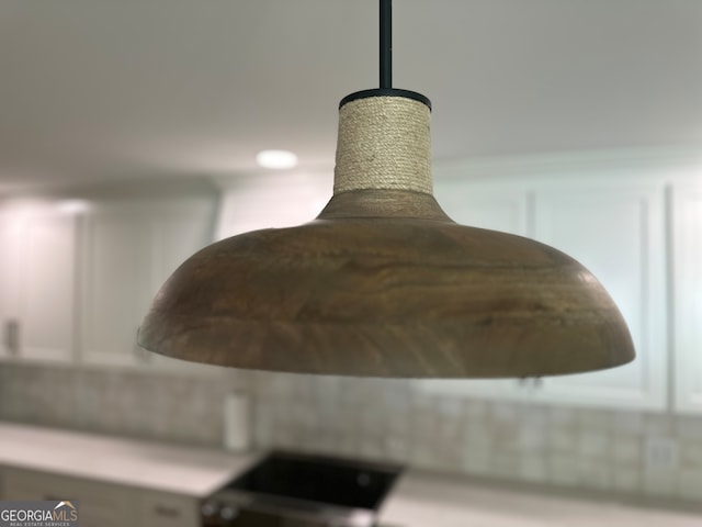 interior details featuring white cabinetry