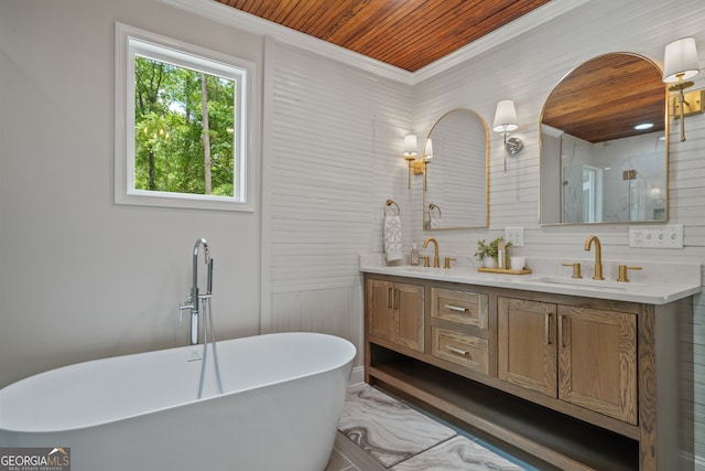 bathroom with ornamental molding, vanity, a washtub, and wood ceiling