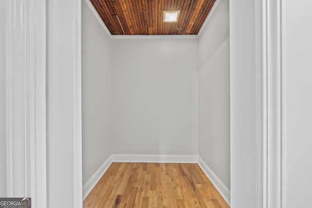 room details featuring wood ceiling and hardwood / wood-style flooring