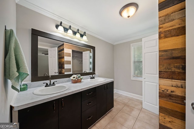 bathroom featuring vanity, ornamental molding, and tile patterned flooring