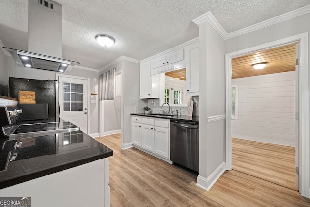 kitchen with white cabinets, tasteful backsplash, exhaust hood, stainless steel dishwasher, and light wood-type flooring