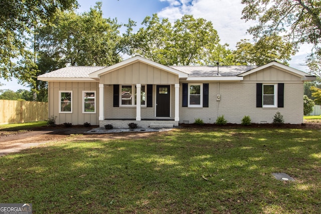 ranch-style house featuring a front lawn