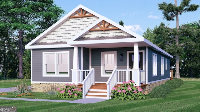 view of front facade featuring a front yard and a porch