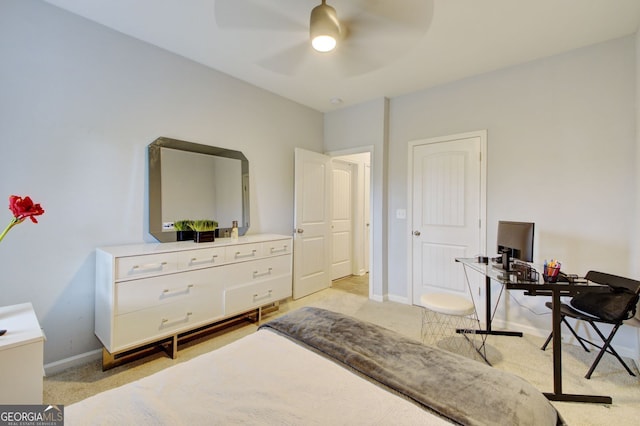 bedroom featuring light carpet