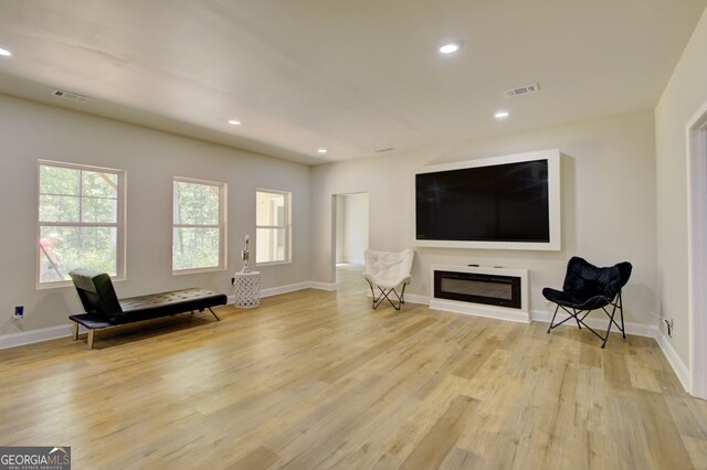 sitting room featuring light wood-type flooring