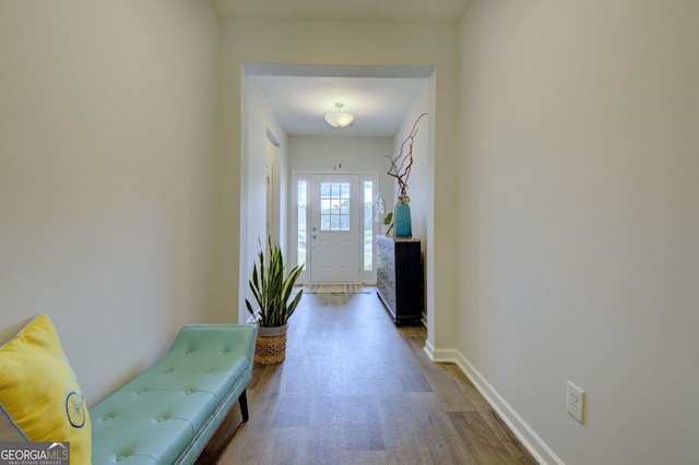 hallway featuring hardwood / wood-style flooring