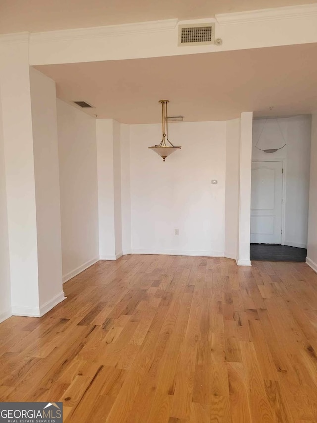 unfurnished room featuring light wood-type flooring