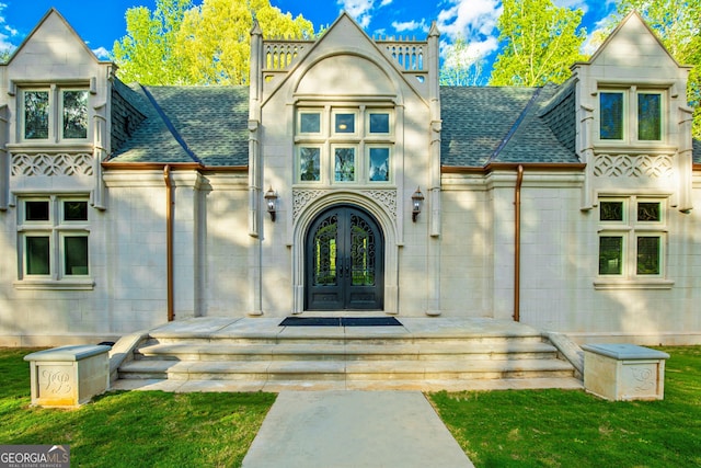 doorway to property featuring french doors