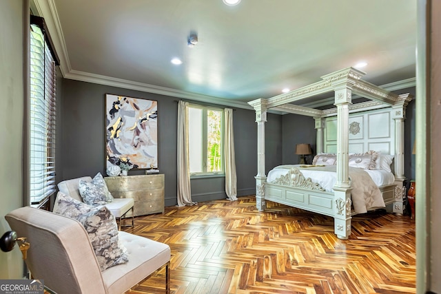 bedroom featuring crown molding, light parquet flooring, and decorative columns