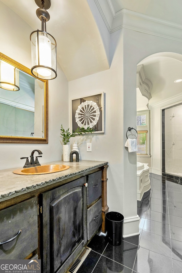 bathroom featuring vanity, ornamental molding, and tile patterned flooring