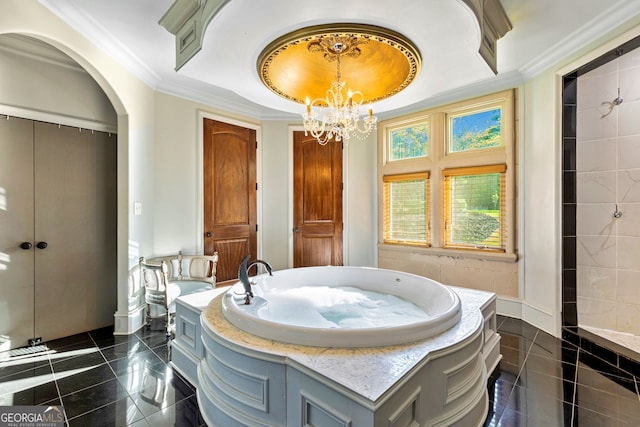 bathroom with a raised ceiling, a washtub, crown molding, an inviting chandelier, and tile patterned flooring