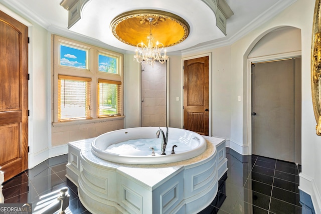 bathroom featuring a tub, a tray ceiling, crown molding, a notable chandelier, and tile patterned flooring