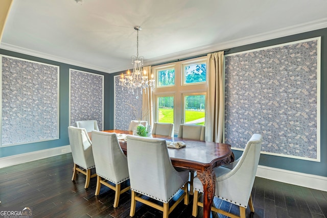 dining room featuring crown molding, dark hardwood / wood-style floors, and a notable chandelier