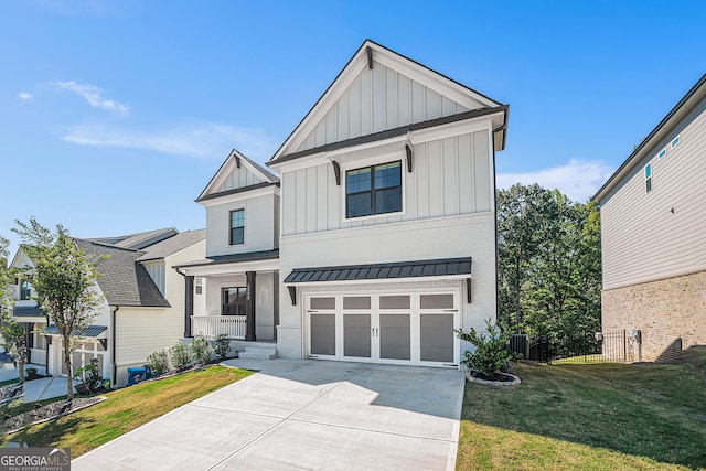 modern farmhouse with cooling unit, a garage, and a front lawn