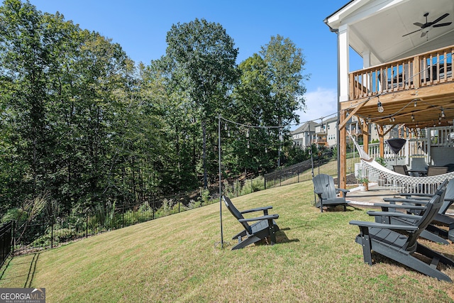 view of yard featuring ceiling fan