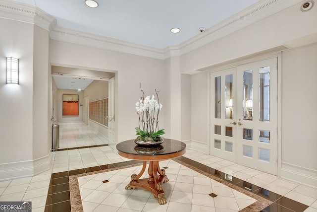 interior space with tile patterned floors, crown molding, and french doors