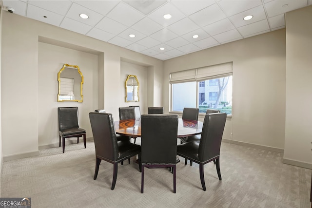 view of carpeted dining space