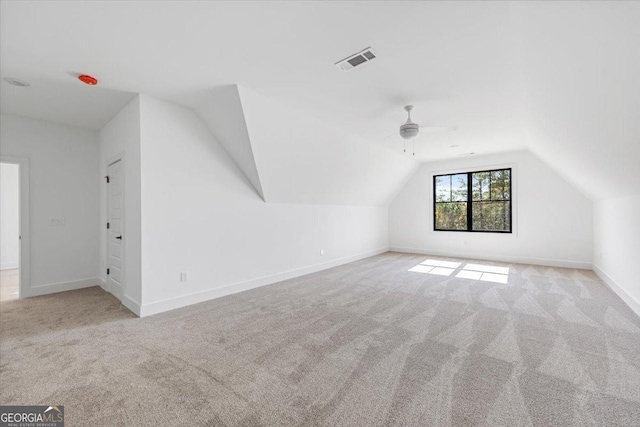612 Forest Pointe Dr, Forsyth, GA 31029 - bonus room featuring lofted ceiling, carpet flooring, and ceiling fan