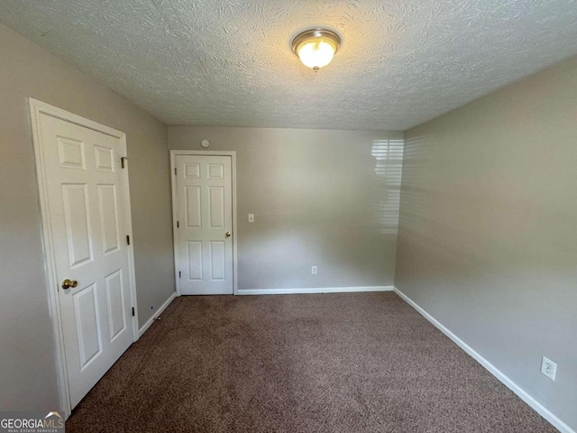 full bathroom with vanity, a textured ceiling, toilet, and shower / washtub combination