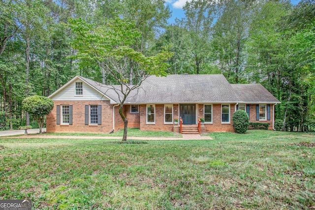 ranch-style house with a front yard