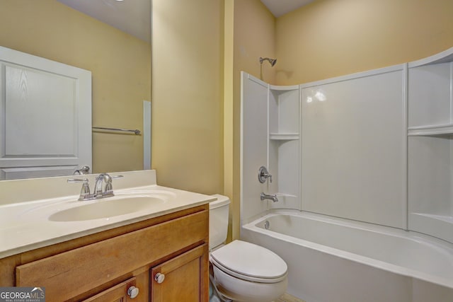 full bathroom with shower / tub combination, vanity, and toilet