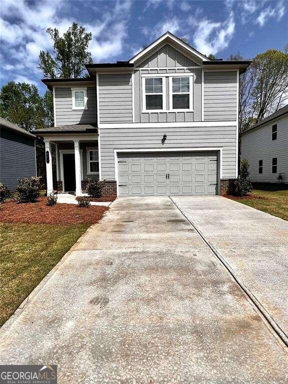 front of property with a garage