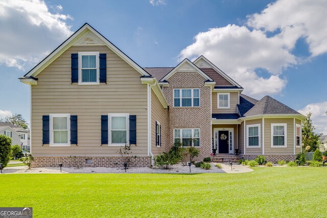 view of front of house with a front lawn