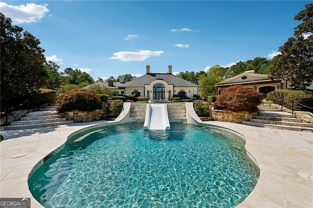 view of pool with a patio