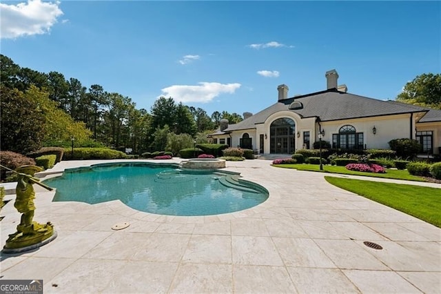 view of pool featuring a patio area