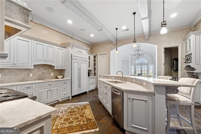 kitchen with a breakfast bar, pendant lighting, white cabinetry, a center island with sink, and dishwasher