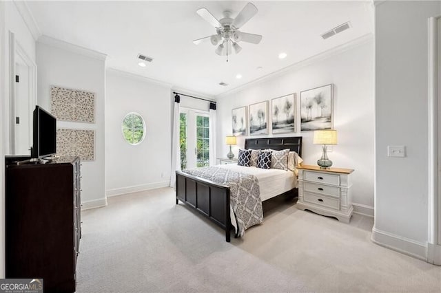 carpeted bedroom featuring ceiling fan and ornamental molding