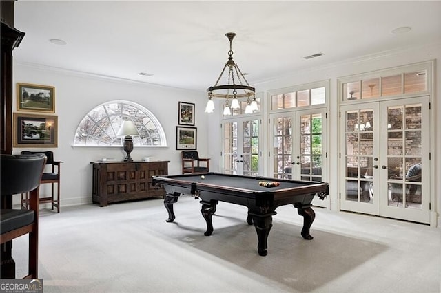 recreation room with french doors, light colored carpet, billiards, and ornamental molding