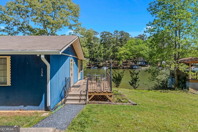 view of yard with a wooden deck