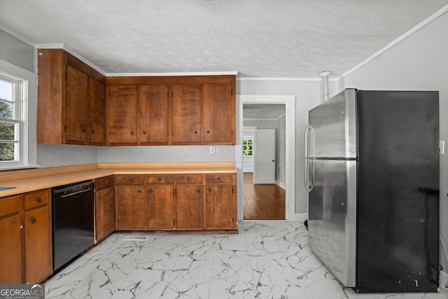 kitchen featuring ornamental molding, black dishwasher, stainless steel fridge, and a textured ceiling