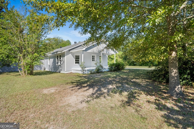 view of yard with a porch