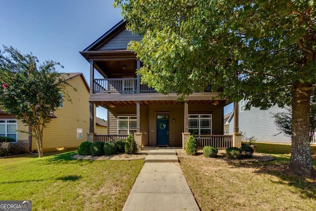 view of front of house featuring a front yard and a porch