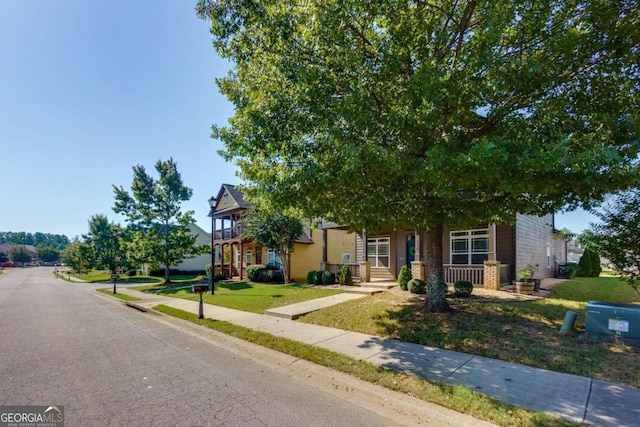 view of front of home with a front yard