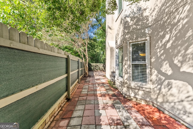 view of property exterior featuring a patio area