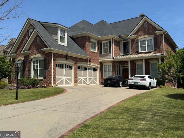 view of side of home with brick siding and a yard