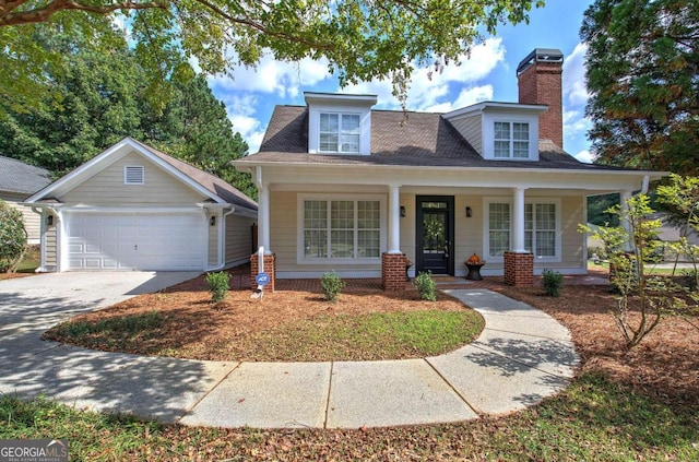 view of front facade with a porch and a garage